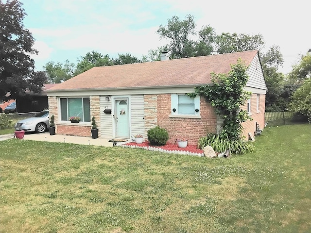 42 Sauk Trl, Park Forest, IL 60466 - view of front facade featuring a chimney and brick siding
