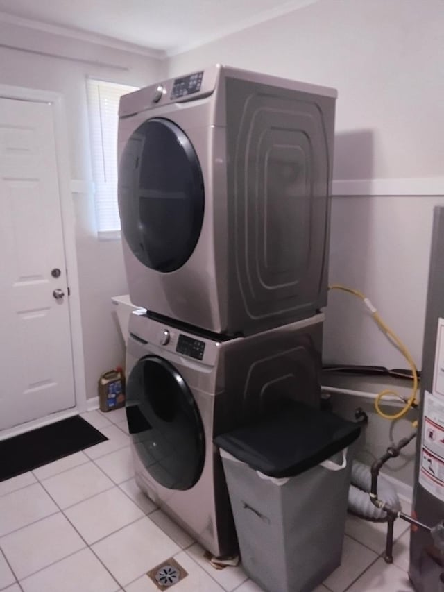 42 Sauk Trl, Park Forest, IL 60466 - washroom with stacked washer / drying machine and light tile patterned floors