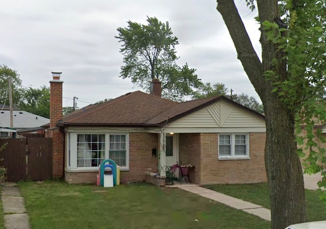 11723 S Harry J Rogowski Dr S, Merrionette Park, IL 60803 - bungalow-style house with brick siding and a chimney