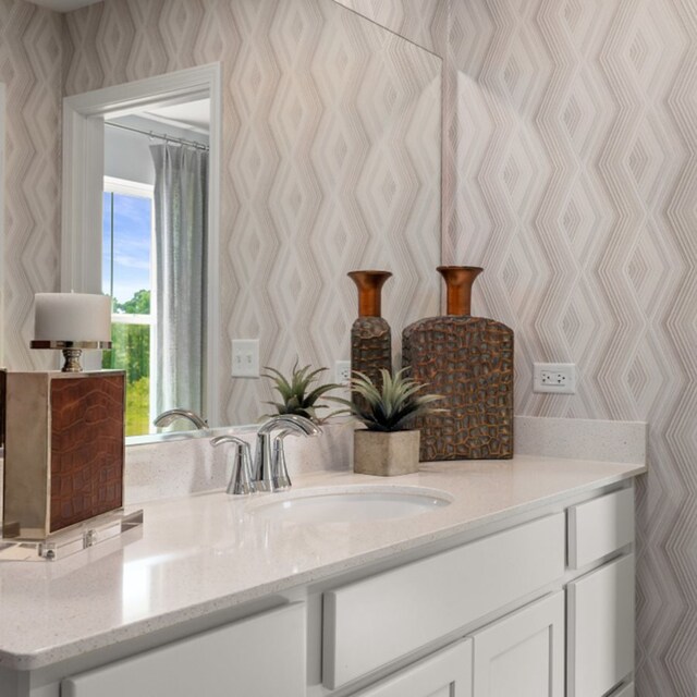 12056 Jordi Rd, Huntley, IL 60142 - bathroom view of vanity and wallpapered walls