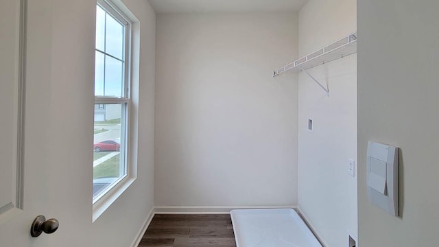 6913 Willow Dr, Wonder Lake, IL 60097 - washroom featuring dark wood-style flooring and baseboards