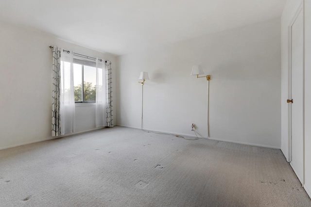 850 Wellington Ave Unit 311, Elk Grove Village, IL 60007 - carpeted empty room featuring baseboards