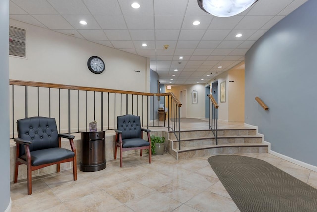 850 Wellington Ave Unit 311, Elk Grove Village, IL 60007 - building lobby with stairs and recessed lighting
