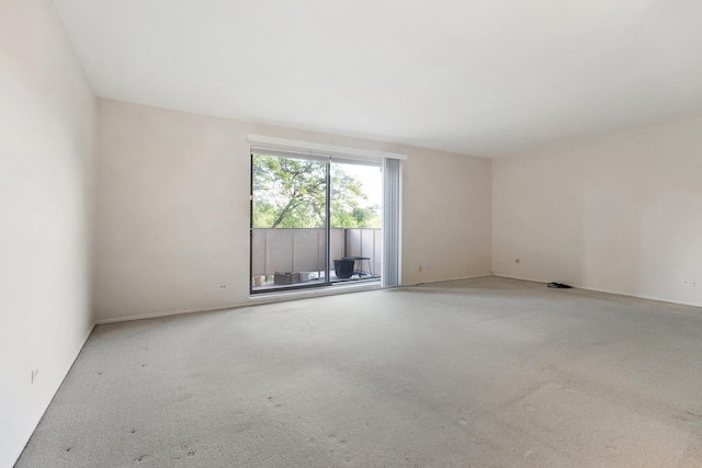 850 Wellington Ave Unit 311, Elk Grove Village, IL 60007 - spare room featuring light colored carpet