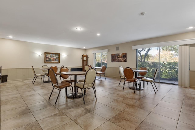 850 Wellington Ave Unit 311, Elk Grove Village, IL 60007 - dining area with wainscoting, recessed lighting, and light tile patterned floors