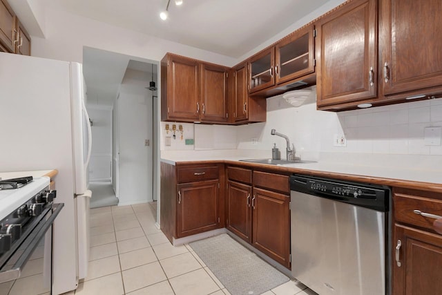 850 Wellington Ave Unit 311, Elk Grove Village, IL 60007 - kitchen with dishwasher, black range with gas cooktop, light countertops, and light tile patterned floors