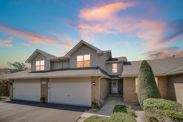 5613 W Von Ave, Monee, IL 60449 - multi unit property featuring brick siding, driveway, and an attached garage