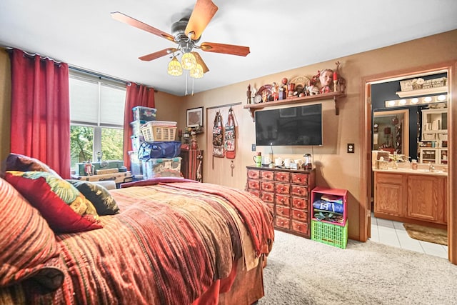 5613 W Von Ave, Monee, IL 60449 - bedroom featuring light carpet, light tile patterned floors, a ceiling fan, and ensuite bath