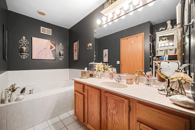 5613 W Von Ave, Monee, IL 60449 - bathroom featuring vanity, tile patterned floors, and a garden tub