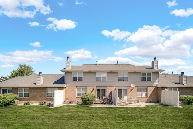 5613 W Von Ave, Monee, IL 60449 - rear view of house with a chimney, brick siding, and a patio