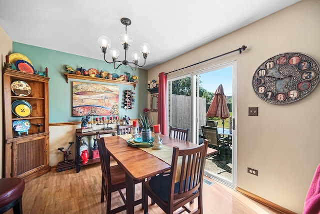 5613 W Von Ave, Monee, IL 60449 - dining room featuring a chandelier and light wood-style floors