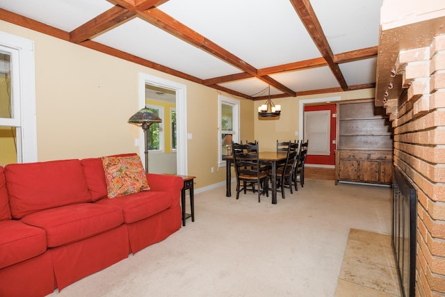 24503 Iroquois Ln, Hudson, IL 61748 - carpeted living room with beamed ceiling, a chandelier, and coffered ceiling