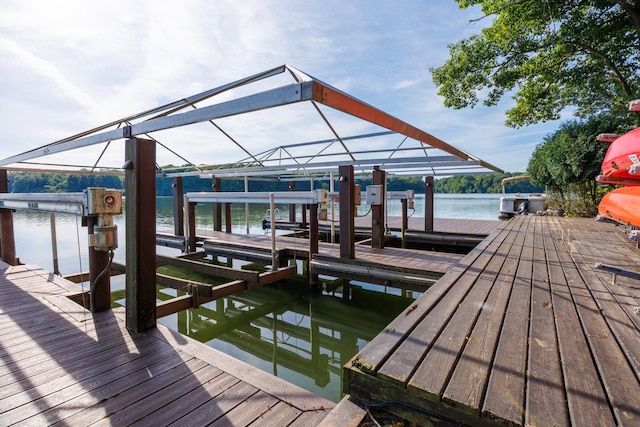 24503 Iroquois Ln, Hudson, IL 61748 - dock area with boat lift and a water view