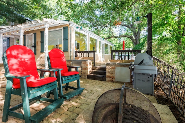 24503 Iroquois Ln, Hudson, IL 61748 - view of patio with area for grilling and outdoor dining space