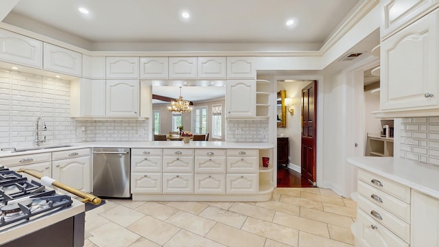570 Hathaway Cir, Lake Forest, IL 60045 - kitchen featuring backsplash, a chandelier, light countertops, white cabinets, and recessed lighting