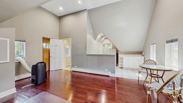 570 Hathaway Cir, Lake Forest, IL 60045 - sitting room with a baseboard heating unit, high vaulted ceiling, wood finished floors, and recessed lighting