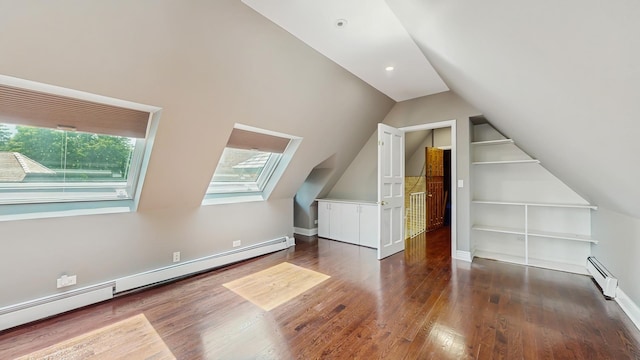 570 Hathaway Cir, Lake Forest, IL 60045 - additional living space with a baseboard heating unit, built in features, lofted ceiling, and wood finished floors