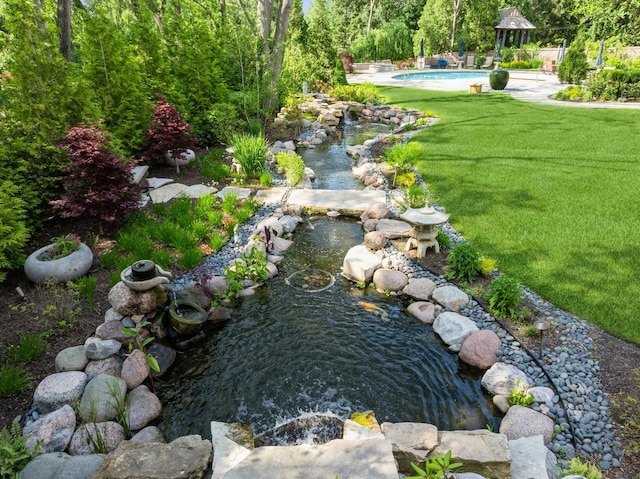 570 Hathaway Cir, Lake Forest, IL 60045 - view of green lawn featuring a gazebo, a garden pond, and an outdoor pool