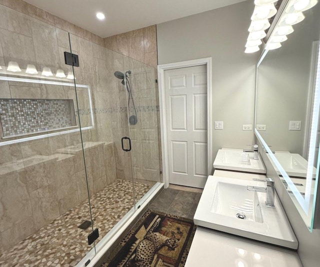 1711 Devonshire Ln, Shorewood, IL 60404 - bathroom featuring a shower stall, double vanity, and a chandelier