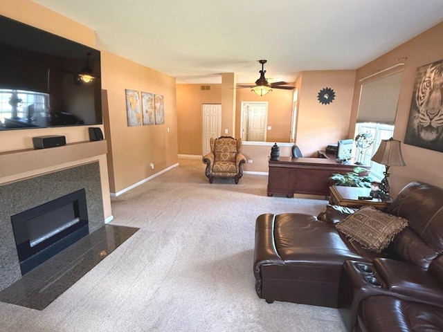 1711 Devonshire Ln, Shorewood, IL 60404 - carpeted living room with ceiling fan and a fireplace with flush hearth