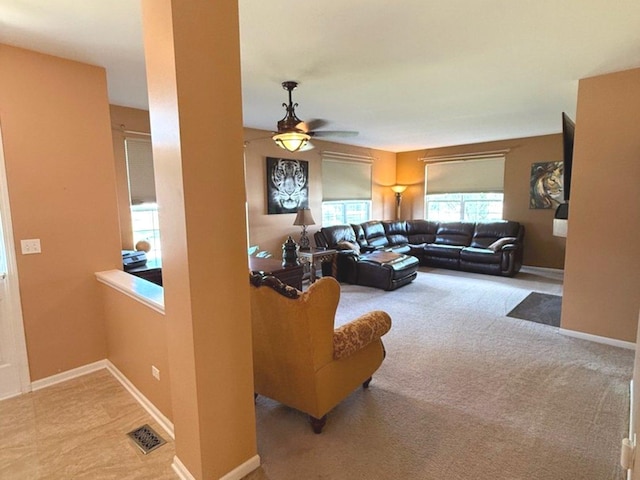 1711 Devonshire Ln, Shorewood, IL 60404 - living room featuring ceiling fan and carpet floors