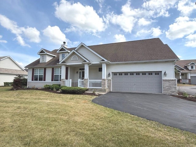 1711 Devonshire Ln, Shorewood, IL 60404 - craftsman-style home featuring a porch, driveway, a garage, a front yard, and brick siding
