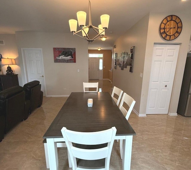1711 Devonshire Ln, Shorewood, IL 60404 - dining space with a chandelier and baseboards