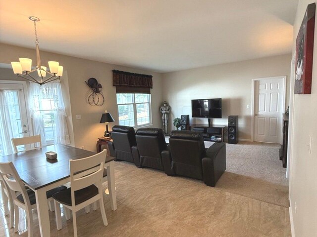 1711 Devonshire Ln, Shorewood, IL 60404 - dining area with a chandelier and light colored carpet