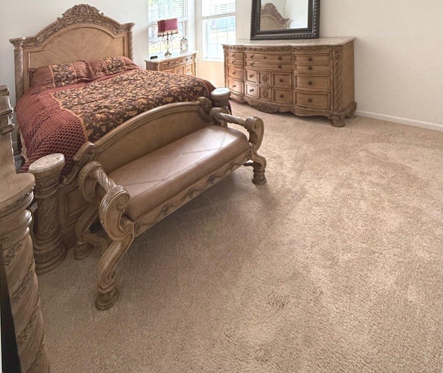 1711 Devonshire Ln, Shorewood, IL 60404 - bedroom with light carpet and baseboards