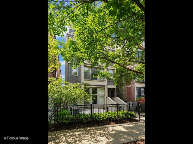 1541 W Montana St Unit 2, Chicago, IL 60614 - view of front of house featuring brick siding
