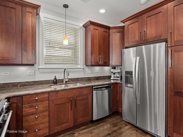1541 W Montana St Unit 2, Chicago, IL 60614 - kitchen with appliances with stainless steel finishes, dark wood-style floors, recessed lighting, hanging light fixtures, and brown cabinets