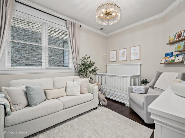 1541 W Montana St Unit 2, Chicago, IL 60614 - bedroom with a chandelier, dark wood-style flooring, and crown molding