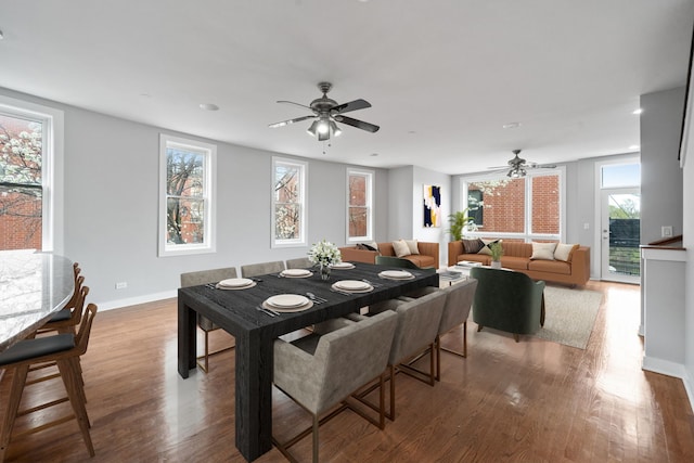 2864 N Riverwalk Dr, Chicago, IL 60618 - dining space with a ceiling fan, wood finished floors, and recessed lighting
