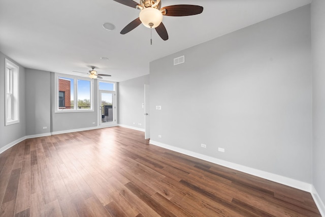 2864 N Riverwalk Dr, Chicago, IL 60618 - spare room featuring a ceiling fan and wood finished floors