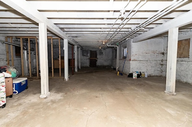 5523 W Huron St, Chicago, IL 60644 - unfinished below grade area featuring water heater