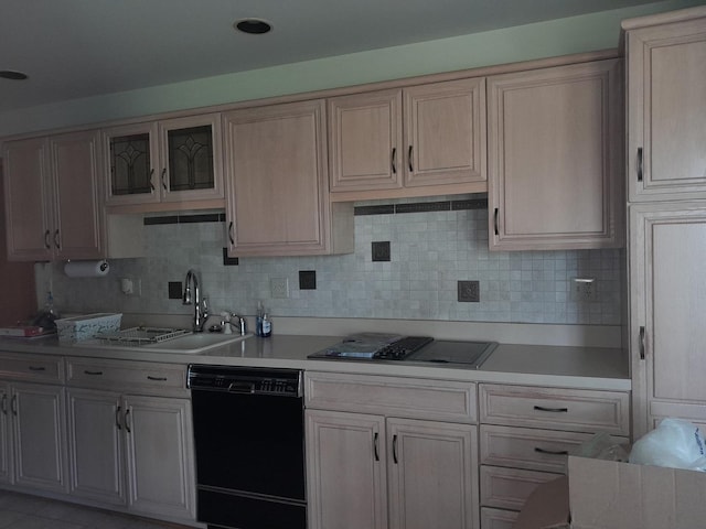 154 E US Highway 34, Mendota, IL 61342 - kitchen with black dishwasher, cooktop, light countertops, and backsplash