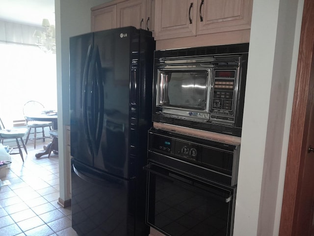154 E US Highway 34, Mendota, IL 61342 - kitchen featuring black appliances and light tile patterned floors