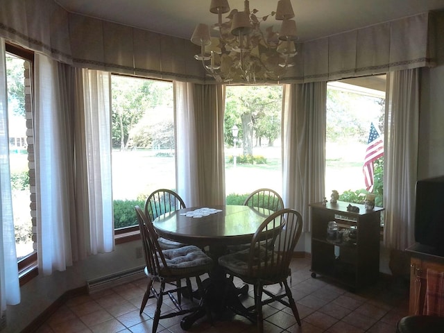 154 E US Highway 34, Mendota, IL 61342 - dining space featuring a chandelier and tile patterned flooring