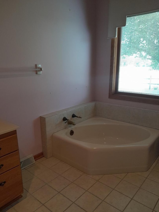 154 E US Highway 34, Mendota, IL 61342 - full bathroom featuring a bath, tile patterned floors, and vanity