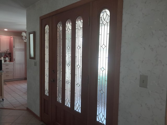 154 E US Highway 34, Mendota, IL 61342 - foyer featuring light tile patterned flooring and plenty of natural light