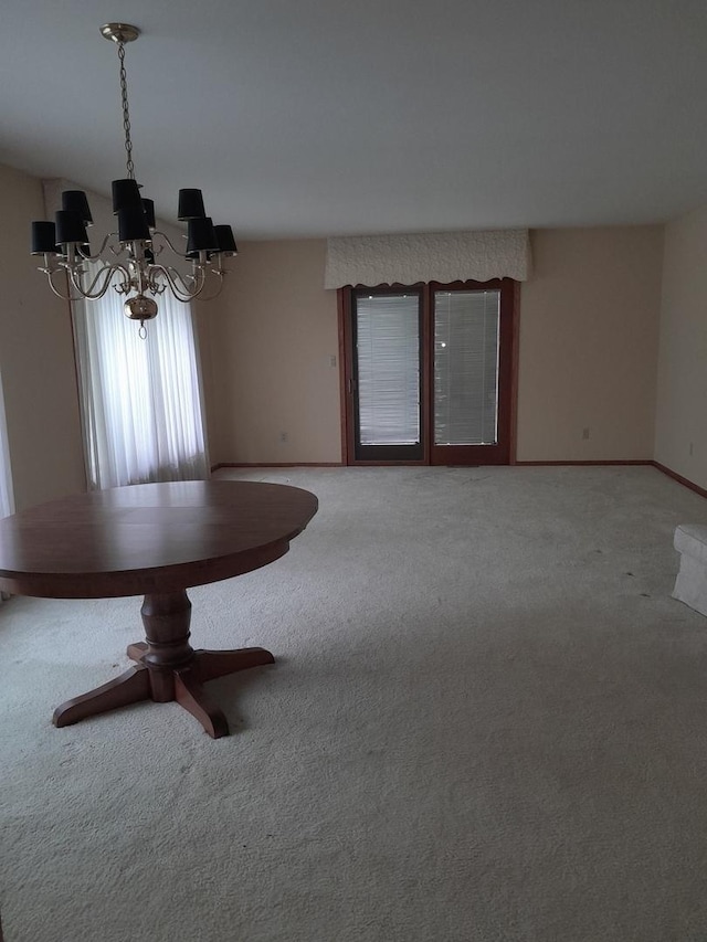 154 E US Highway 34, Mendota, IL 61342 - unfurnished dining area featuring carpet floors and a chandelier