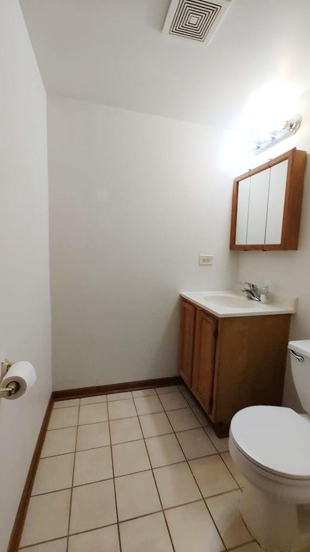 222 W 26th St Unit 202, Chicago, IL 60616 - half bath with vanity and tile patterned floors
