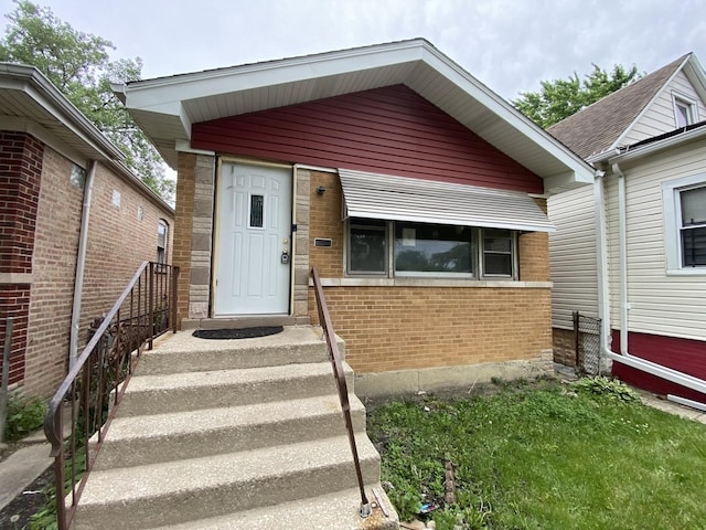 9221 S Normal Ave, Chicago, IL 60620 - doorway to property with brick siding
