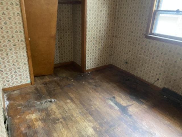 9221 S Normal Ave, Chicago, IL 60620 - unfurnished bedroom with hardwood / wood-style flooring and wallpapered walls