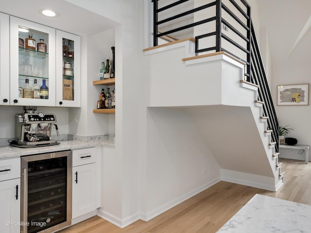2026 W Pierce Ave Unit 7, Chicago, IL 60622 - indoor dry bar featuring wine cooler, light wood-type flooring, stairs, and recessed lighting