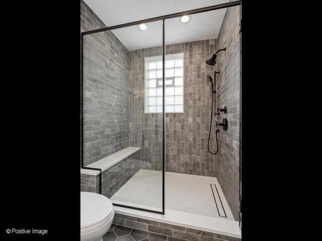 2026 W Pierce Ave Unit 7, Chicago, IL 60622 - bathroom featuring tile patterned flooring, a stall shower, and recessed lighting