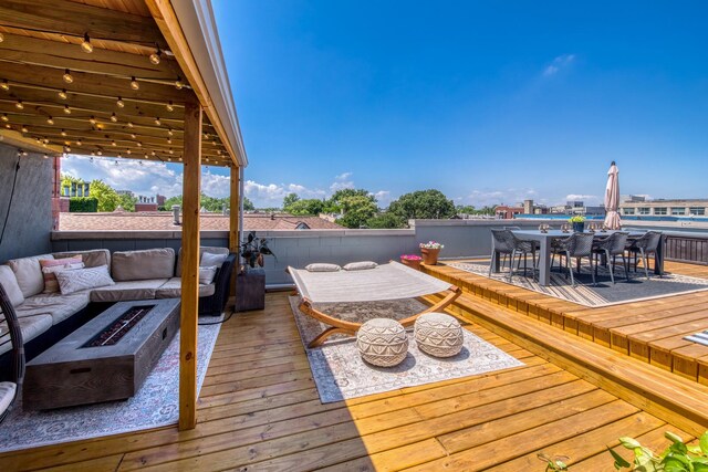 2026 W Pierce Ave Unit 7, Chicago, IL 60622 - deck with outdoor dining area and an outdoor living space with a fire pit