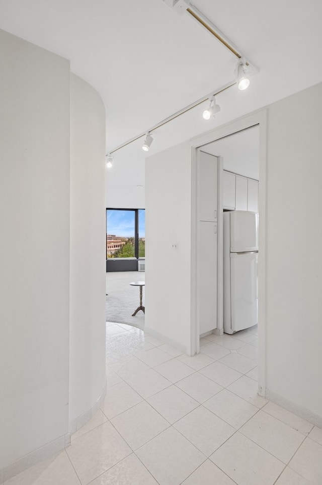 505 N Lake Shore Dr Unit 408, Chicago, IL 60611 - empty room featuring rail lighting and light tile patterned floors