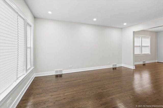 2552 W 117th Pl, Chicago, IL 60655 - empty room with dark wood-style floors and recessed lighting