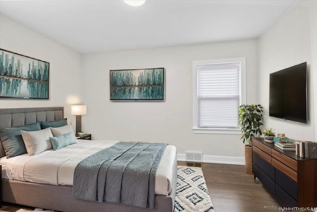 2552 W 117th Pl, Chicago, IL 60655 - bedroom featuring dark wood-style floors and baseboards